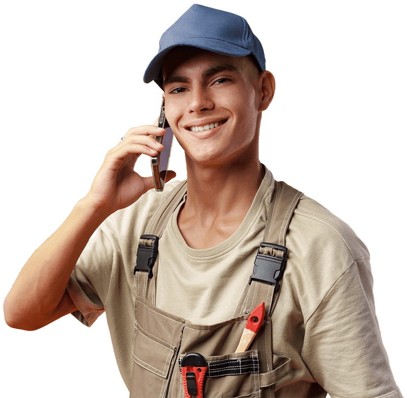 young-builder-talking-on-a-mobile-phone-against-resize